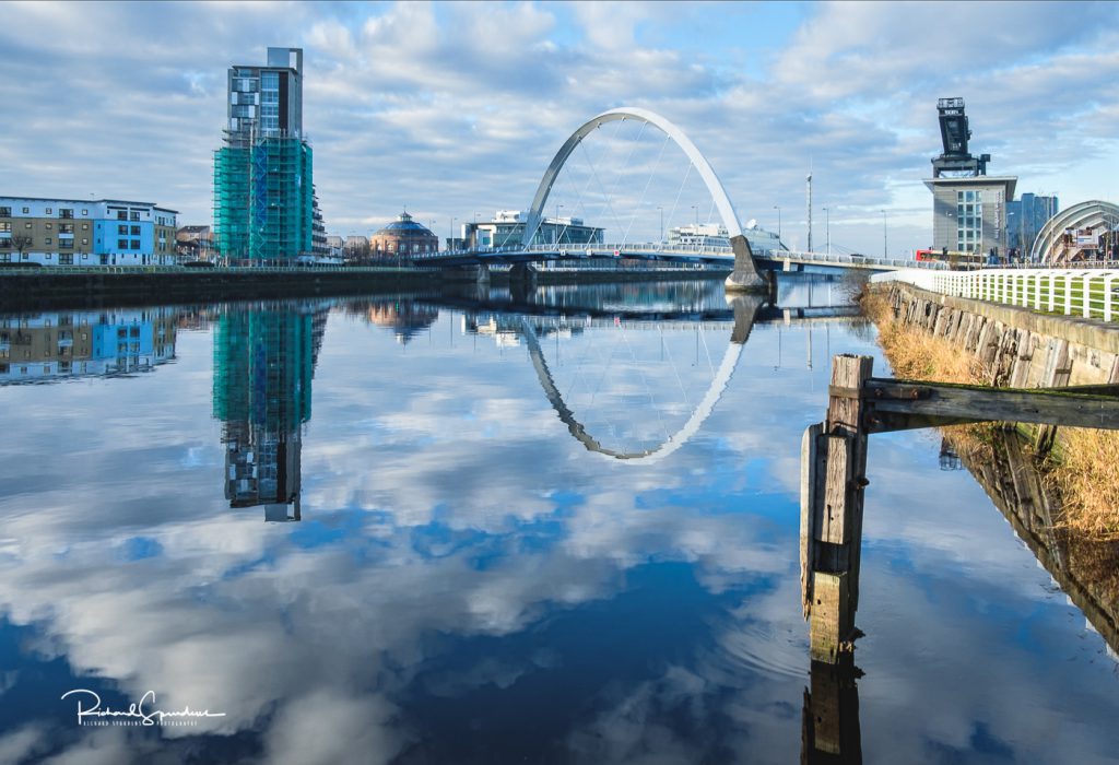 a landscape view from the clyde river and clyde arc bridge