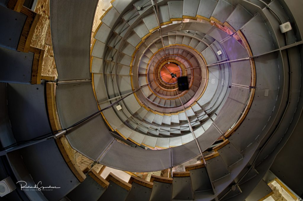 looking up from the bottom of the lighthouse stairs