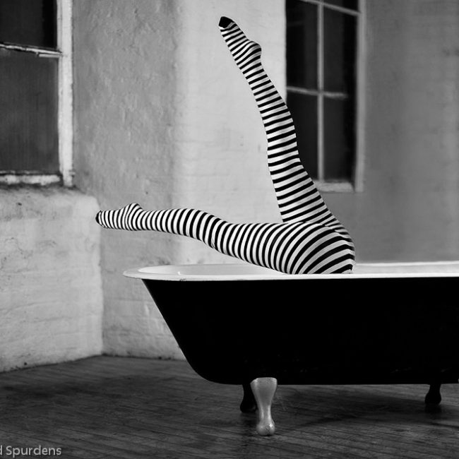 fashion photographer - fashion photography - striped tights in a bath