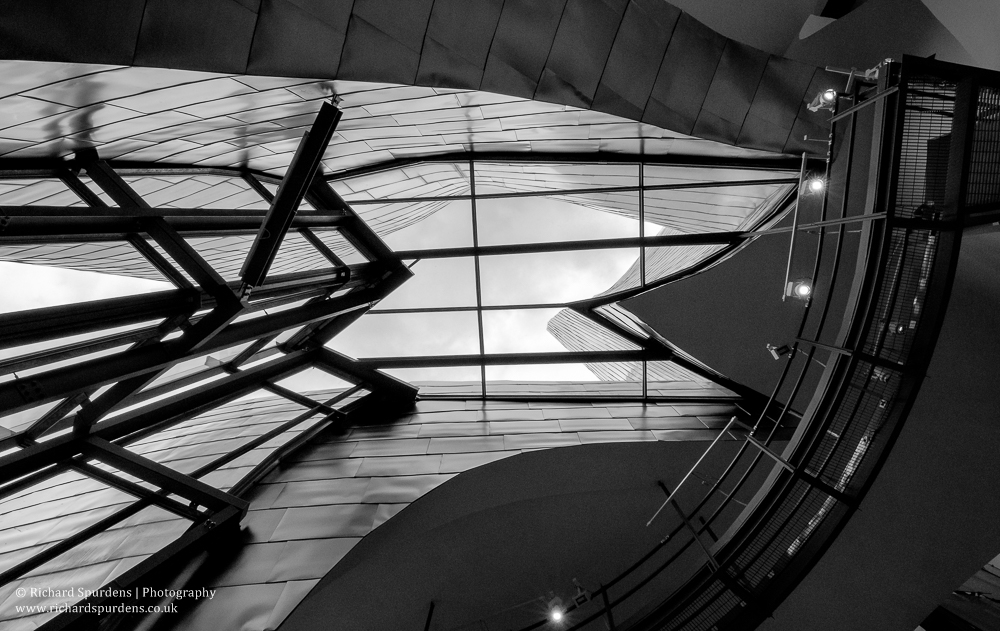 Architecture Photography - Architecture Photographer - glass and steel interior of the guggenheim museum Bilbao looking up