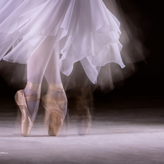 dance photographer - dance photography - a slow shutter speed image of a dancer spinning on pointe from a studio Session with Alexa Hilton at the Studio Factory,