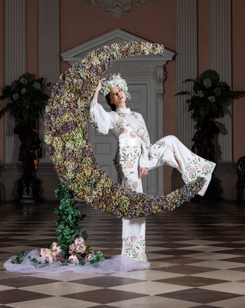 Fashion Photography - Fashion Photographer - Image showing model Jaye Hicks jumping the floral moon