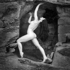 artristc nude photograher - artristc nude Phtography - november print of the month is a monochrome figure study of the model elle beth in a sandstone rock opening itled rough and smooth