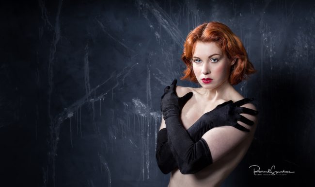 artristc nude photograher - artristc nude Phtography - colour image featuring a red haired model wearing only black glove
