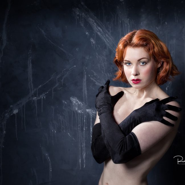 artristc nude photograher - artristc nude Phtography - colour image featuring a red haired model wearing only black glove