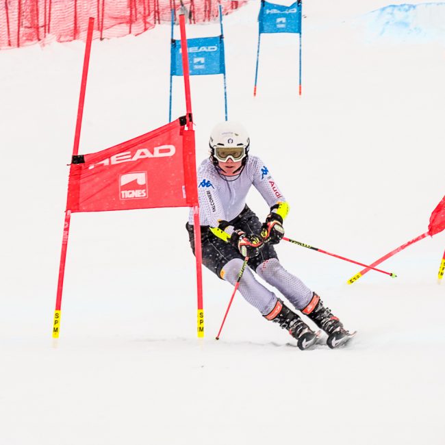 Sports photography - Sports Phoptographer - colour image of dual slalom competitor racing for the line