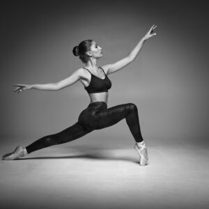 Dance Photographer - Dance Photography - dancer her front leg bent and held on poinet