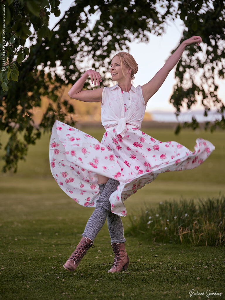 dance photographer - dance photography - outdoor dance moves with dancer Fanny Muller in a white dress with red flowers patterns