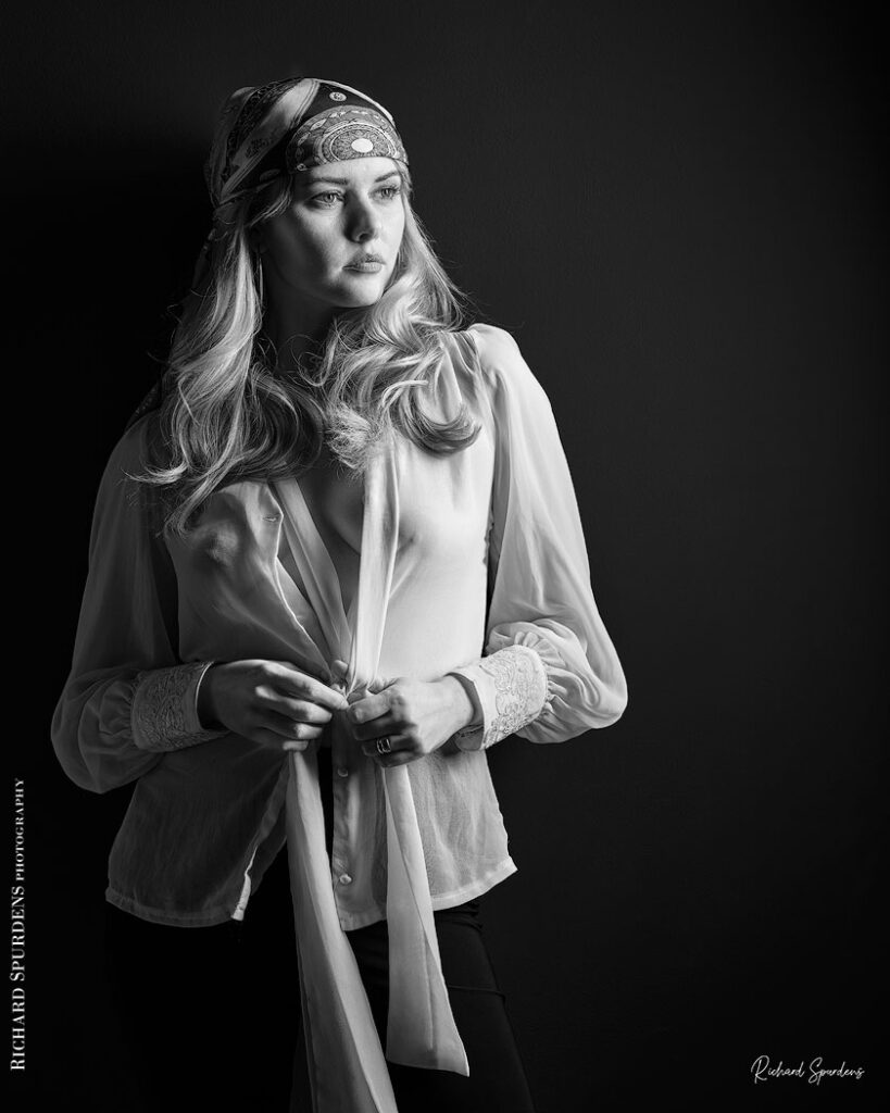 fashion photography fashion photographer - monochrome image of model wearing a white blouse and patterned bandana