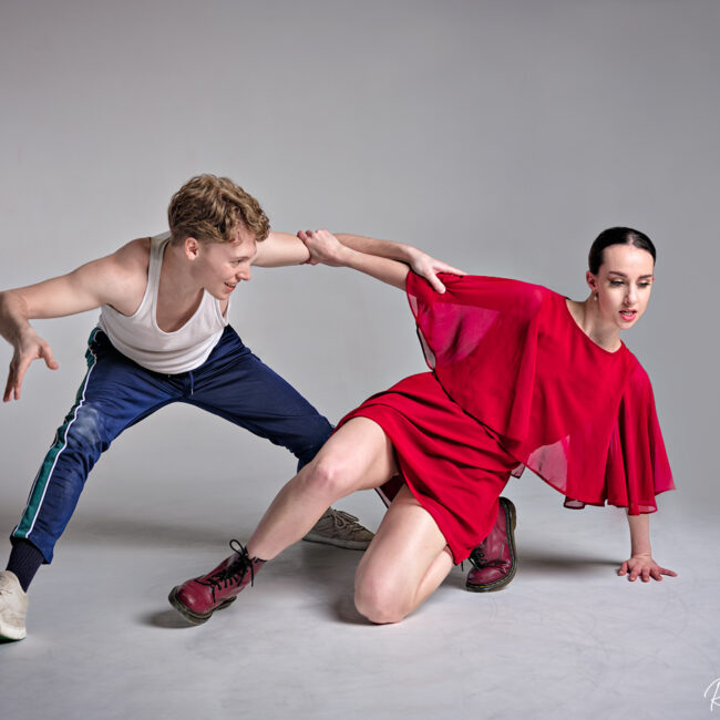 dance photographer - dance photography - duo pairing of male and female dancers performing a contempory dance moves