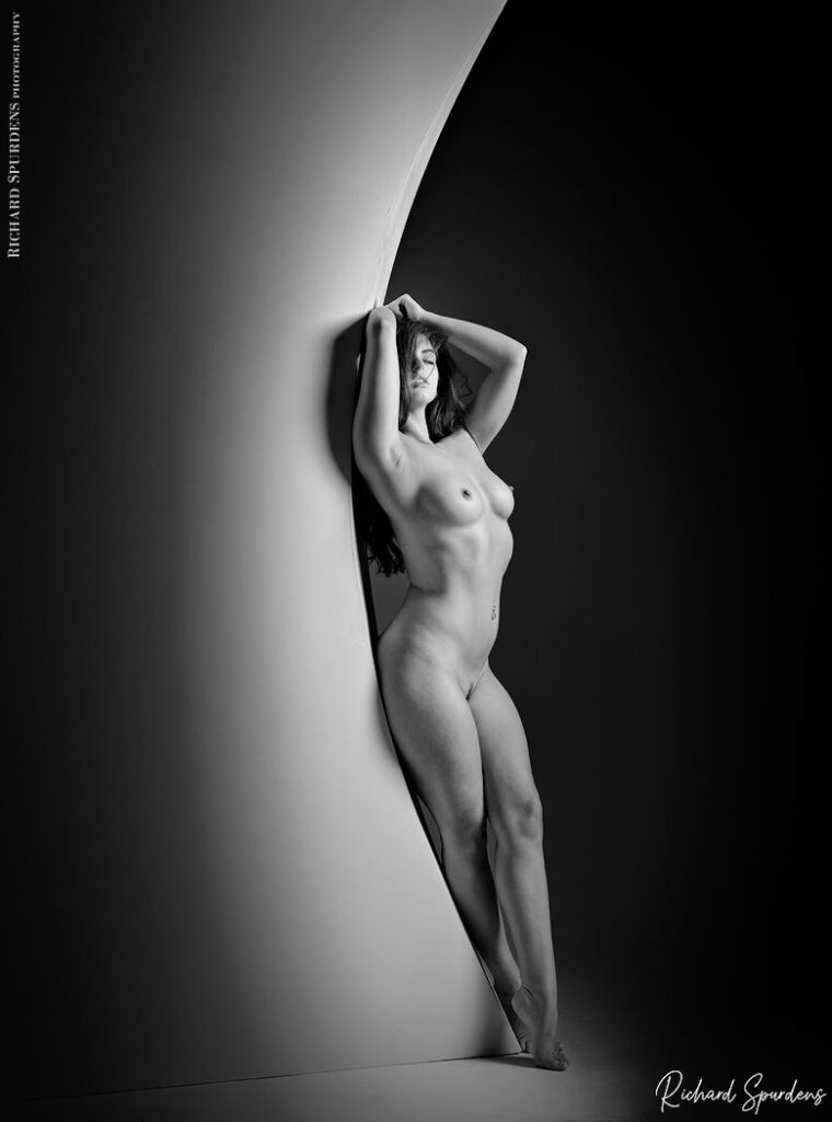 fine art nude photography- fine art nude photographer - artistic nude shapes on a curved wall